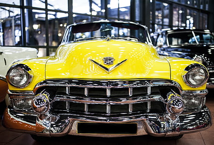 selective focus photography of a classic yellow car thumbnail