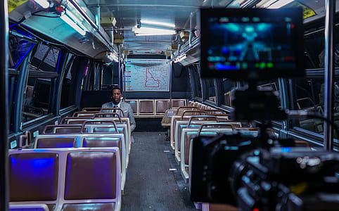 man sitting inside train thumbnail
