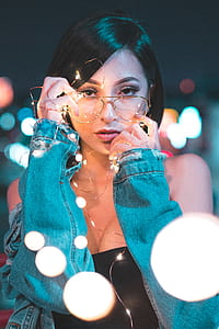 woman wearing green denim sleeves thumbnail