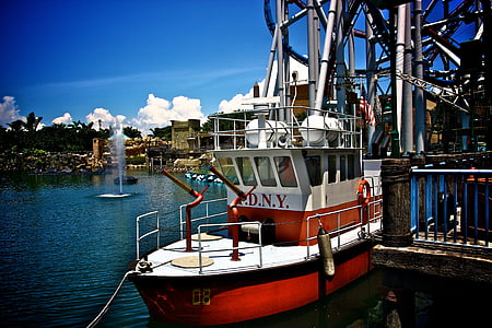 white and red F.D.N.Y. boat on dock thumbnail