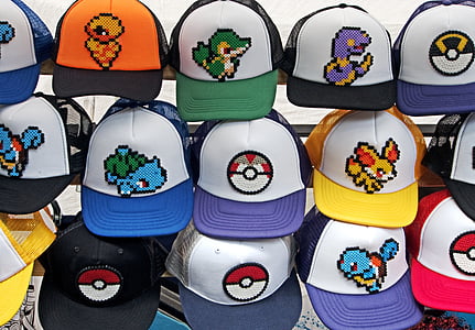 pile of assorted-color Pokemon trucker hats thumbnail