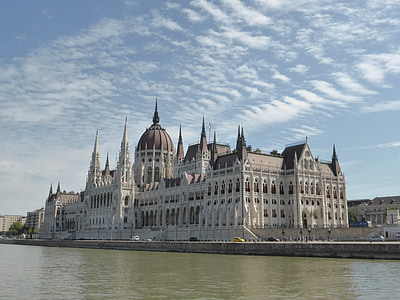 white cathedral near body of water thumbnail