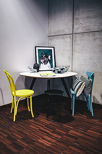 Collection of chairs and tables arranged at a design exhibition thumbnail