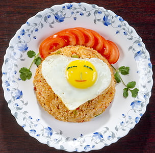 fried rice on white ceramic plate thumbnail