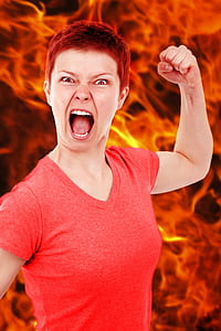 woman in red v-neck top with flame background thumbnail