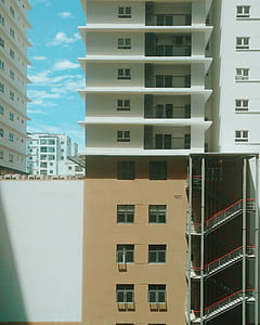 white and brown high-rise building thumbnail