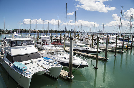 white boats on body of water thumbnail