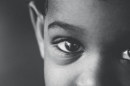 grayscale photo of toddler's face thumbnail