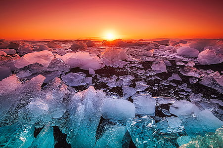 ice berg during sunset thumbnail