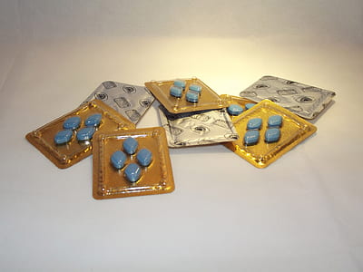 bunch of blister packs on white surface thumbnail