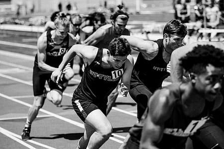 grayscale photography of runners thumbnail