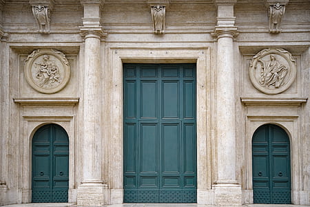 closed green wooden door thumbnail
