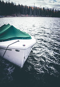 white yacht on body of water thumbnail