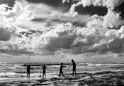 children silhouette on beachshore thumbnail