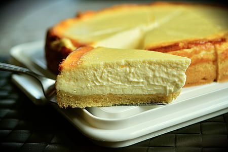 slice of cake on white plastic plate thumbnail