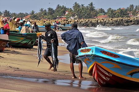 people standing near boat during daytime thumbnail