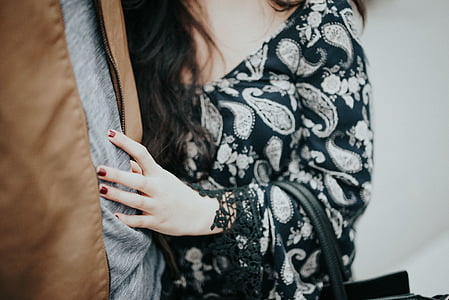 woman leaning on man's chest thumbnail