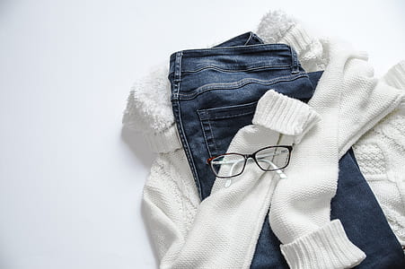 blue denim jeans and white turtle-neck jacket thumbnail