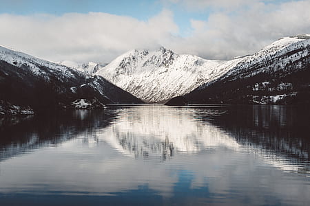 aerial view photography of snow covered mountain thumbnail