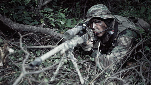 man sniping on forest thumbnail