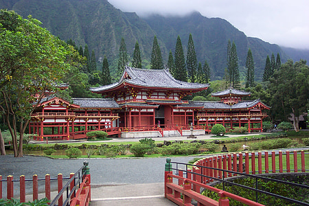 red and brown house beside mountain thumbnail
