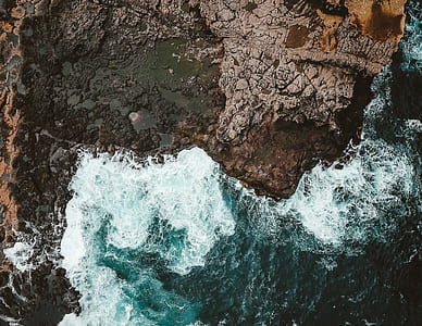 aerial view of body of water during daytime thumbnail
