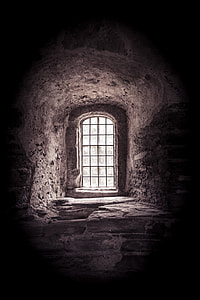 gray and beige stone tunnel with glass frame window thumbnail