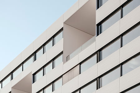 white building with glass window thumbnail