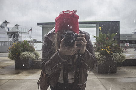woman taking photo in front of the mirror thumbnail