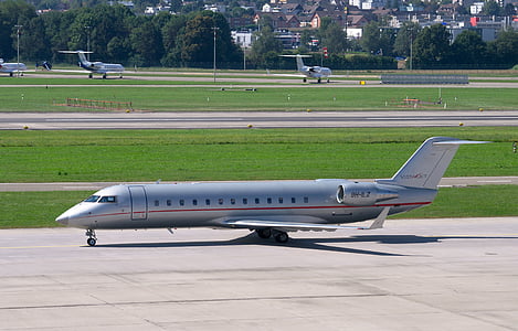 grey plane photo during daytime thumbnail