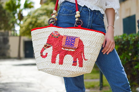 white and red woven tote bag thumbnail