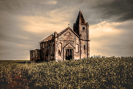 gray concrete church under gray sky thumbnail
