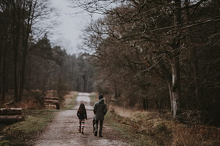 person in gray jacket walking at pack thumbnail
