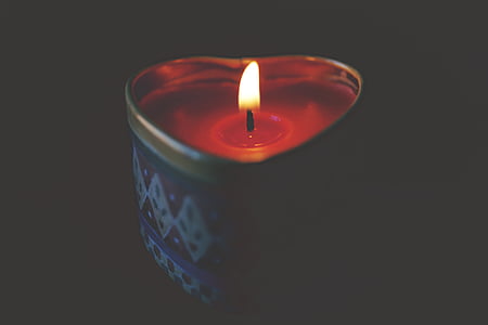 lit heart shaped candle thumbnail