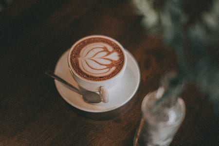 coffee latte in teacup with saucer thumbnail