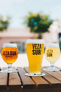 Selective Focus Photography of Beer on Wooden Table thumbnail