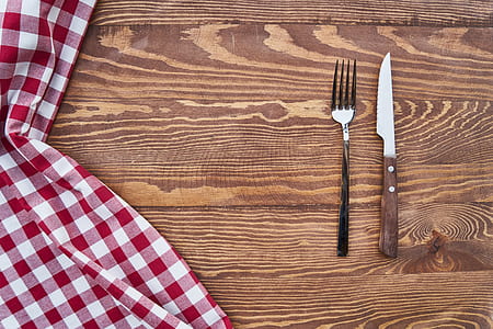 silver fork beside knife thumbnail