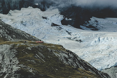 white and green mountain near snow thumbnail