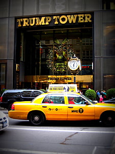 taxi cab in street during daytime thumbnail