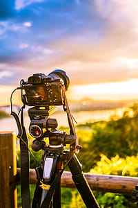 Selective Focus Photo of Dslr Camera With Tripod Stabilizer thumbnail