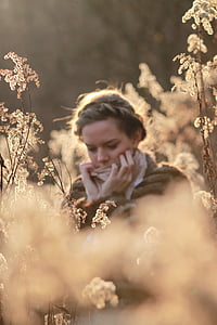 girl wearing brown coat at daytime thumbnail
