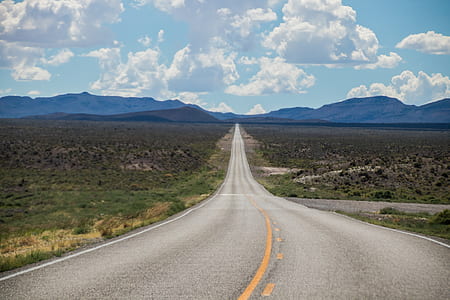 photo of roadway between grass field thumbnail