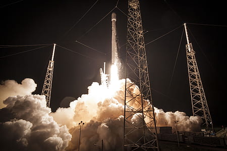 rocketship launching during nighttime thumbnail