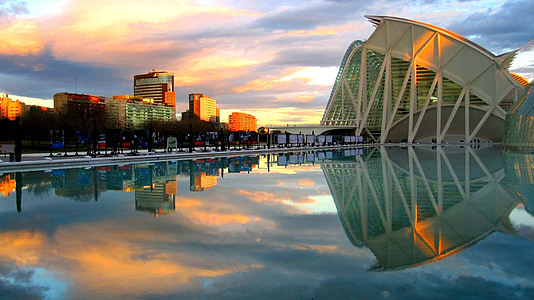 architectural photography of white building surrounded by body of water thumbnail