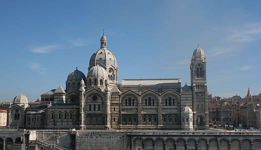 gray concrete cathedral under blue sky thumbnail