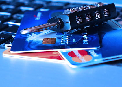black and gray combination lock on blue and white card thumbnail
