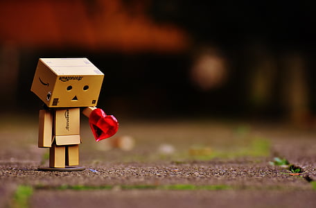 shallow focus photography of cardboard box figure thumbnail