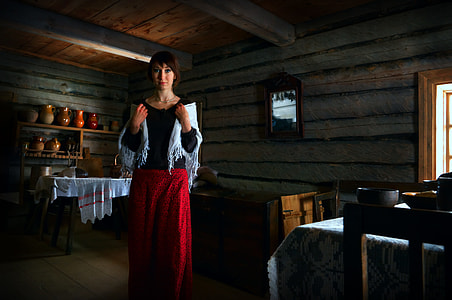 woman in black and red long-sleeved dress thumbnail