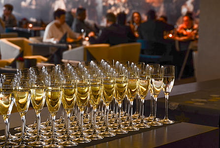 shallow focus photography of flute champagne glasses thumbnail