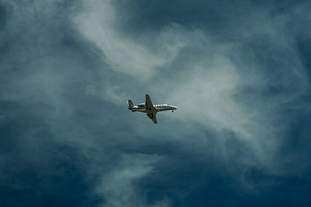 low angle view of plane on sky thumbnail